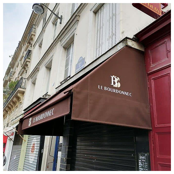 Rentoilage de stores de Boucherie à Paris - Le Store Parisien